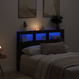 Omarica za vzglavje postelje LED črna hrast 140x17x102 cm