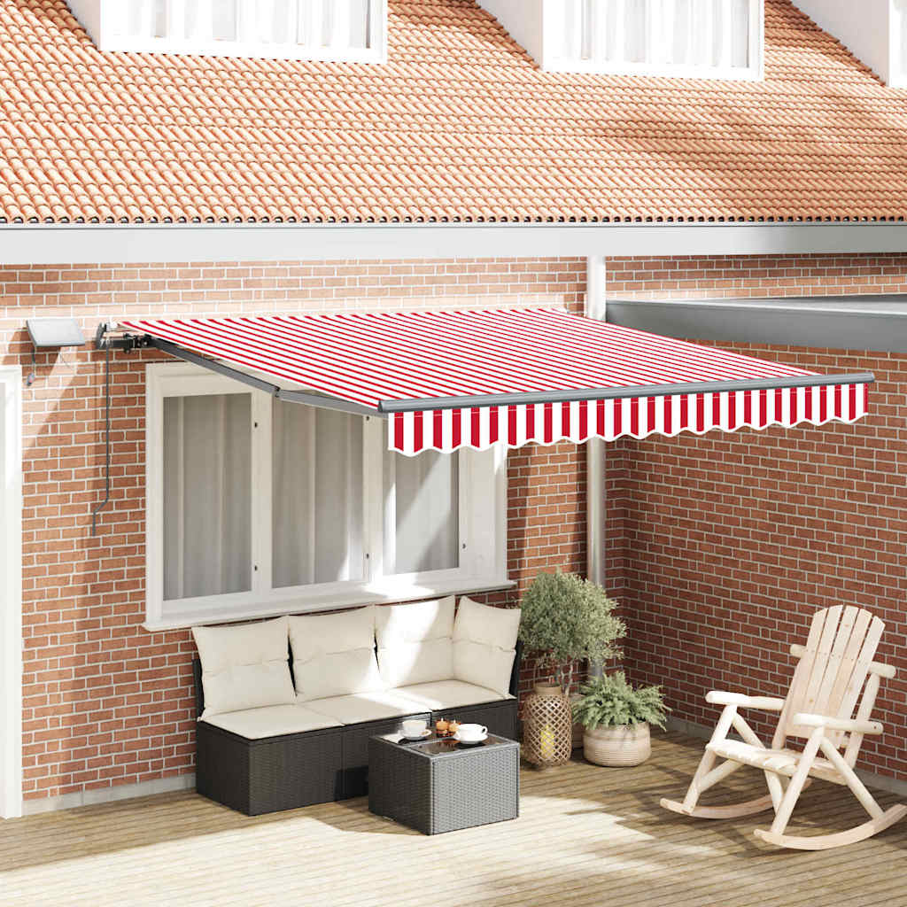 Manuaalne sissetõmmatav varikatus LED punase ja valge triibuga 350x250 cm