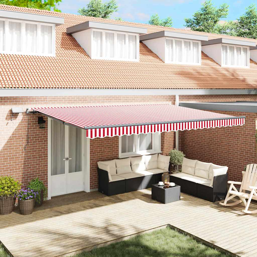 Käsitsi sissetõmmatav varikatus LED punase ja valge triibuga 500x350 cm