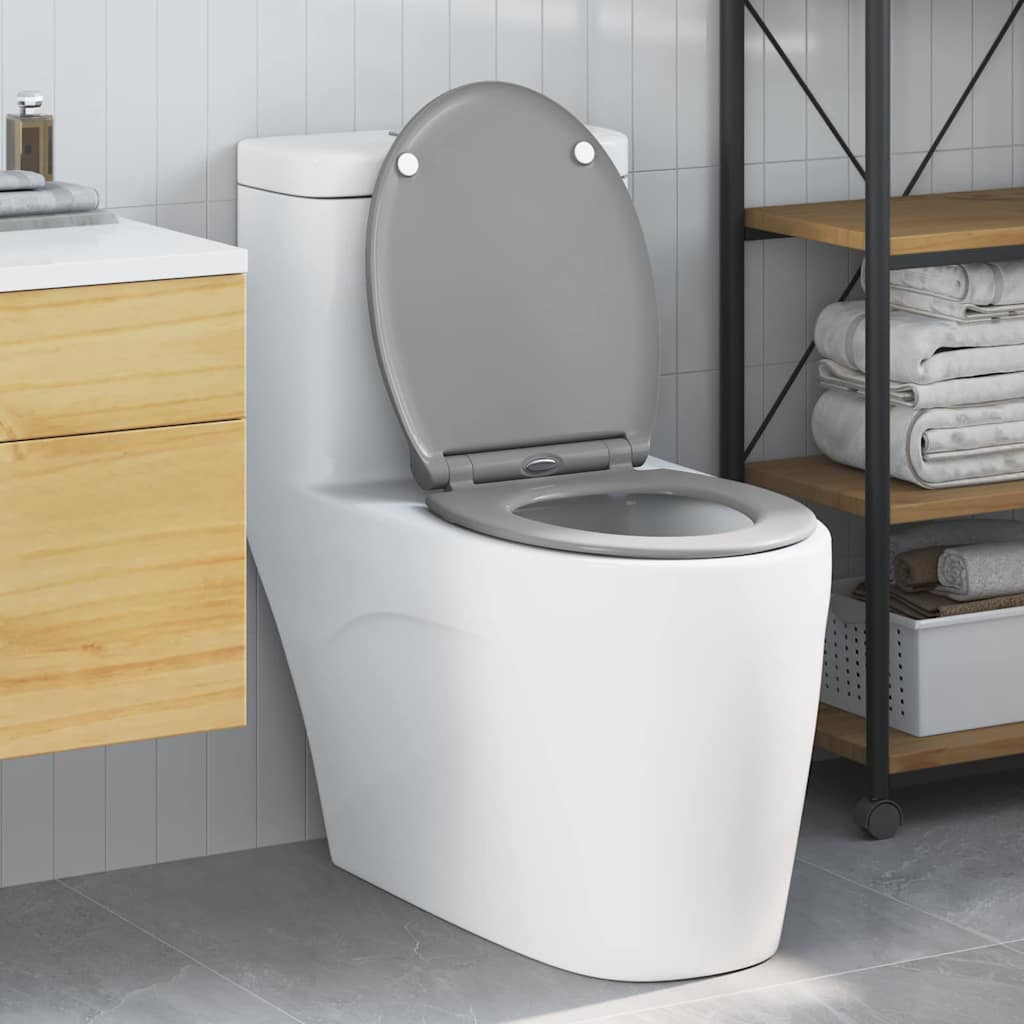 Siège de toilette à libération rapide avec fermeture douce en duroplast gris
