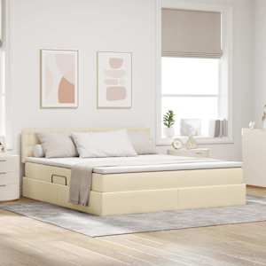 Postelja z dodatnim prostorom za shranjevanje in vzmetnico